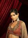 CRIMSON RED QUILTED BLOUSE WITH BOX PLEATED PANTS AND SEPIA BROWN CAPE