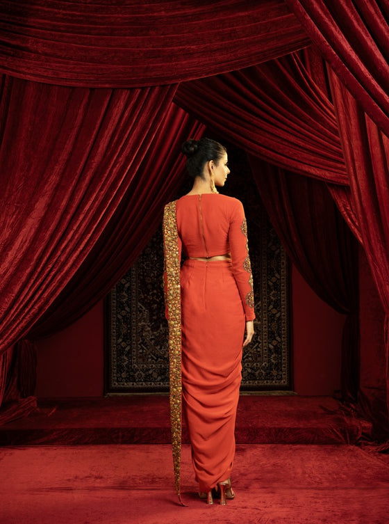 BURNT TERRACOTTA DRAPE SKIRT SET WITH EMBROIDERED CUTWORK PALLA & FULL SLEEVE BLOUSE