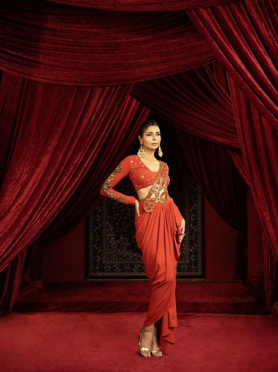 BURNT TERRACOTTA DRAPE SKIRT SET WITH EMBROIDERED CUTWORK PALLA & FULL SLEEVE BLOUSE