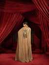 CRIMSON RED QUILTED BLOUSE WITH BOX PLEATED PANTS AND SEPIA BROWN CAPE