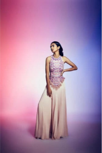 Fully embroidered top with criss cross strings along with paneled pants.