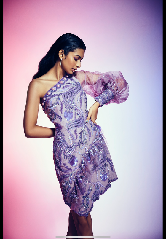 One shoulder dress with ballon sleeve cuff style .