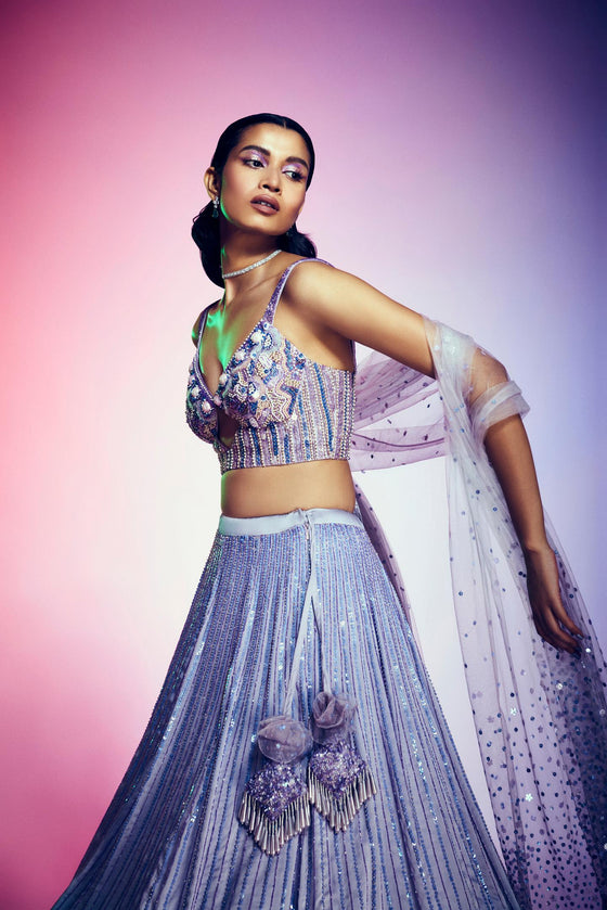 Sexy bralette blouse with lehenga full embroidery ombray with net dupatta.
